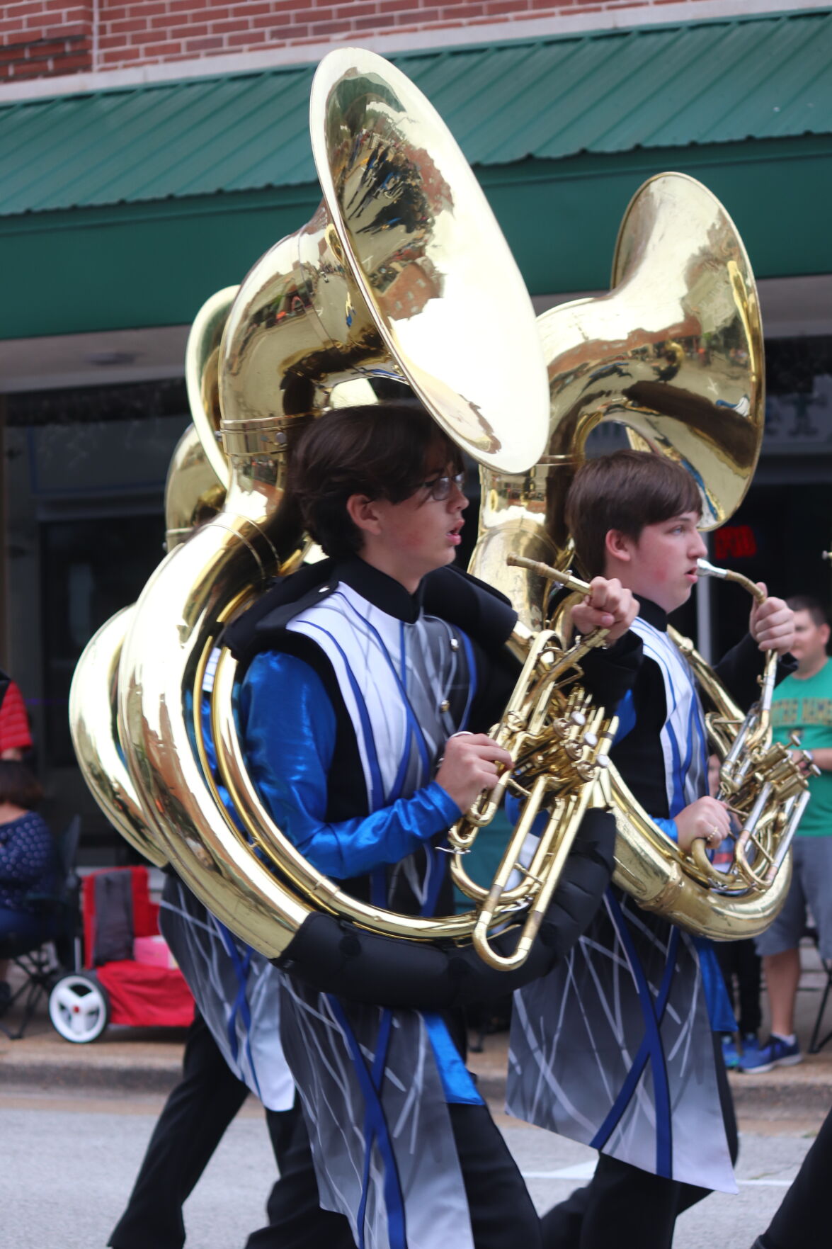 Tuba players perform in parade